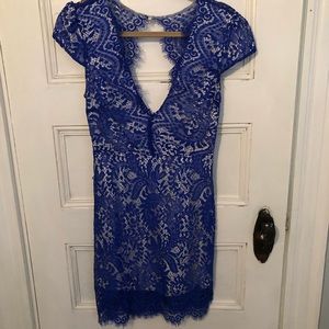 Blue lace dress with open back detail